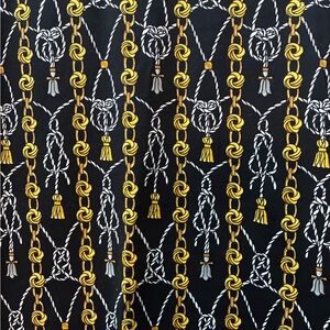 Elegant Black Dress with Gold and Silver Rope Pattern